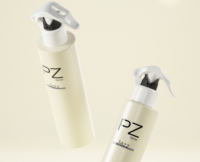 Two cream-colored spray bottles labeled PZ Jazz, each topped with a Mini Trigger Spray Pump in white and black, floating against a light beige background.