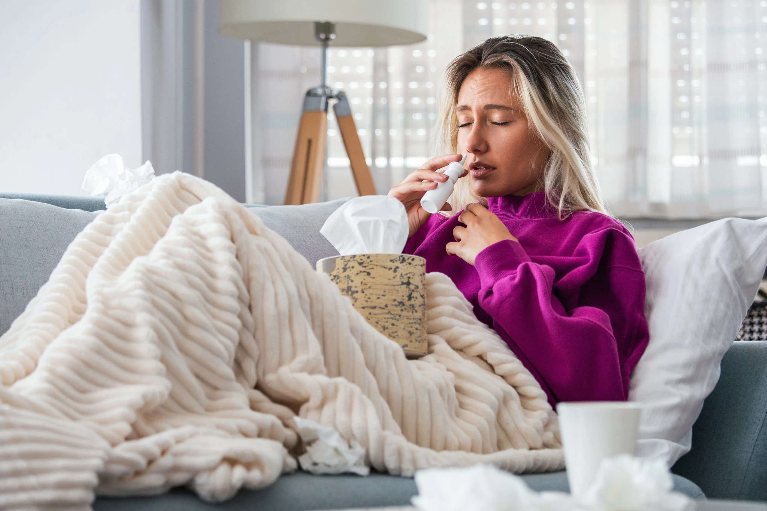 Patient_using_Aptar_Pharma_nasal_spray