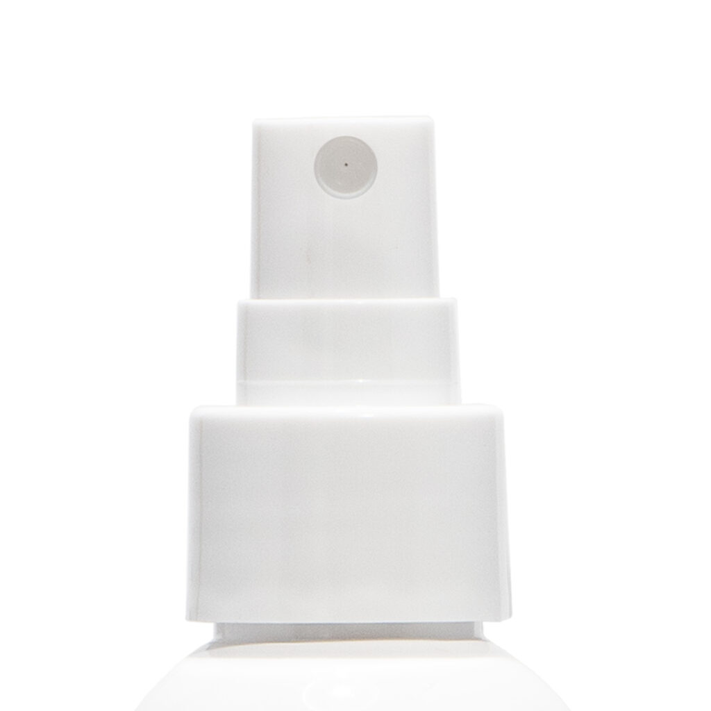 Close-up of Euromist Heaven, a white plastic spray pump nozzle against a plain white background. The nozzle is centered and clearly visible.