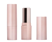 A rose gold non guided lipstick packaging is shown closed, next to an open version with the cap placed beside it, revealing the product inside.