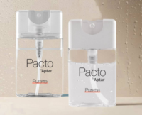 Two Purette Fine Mist bottles with flat mini packaging stand side by side on a light surface, lightly covered with water droplets. Each bottle features a white spray top and contains a clear liquid.