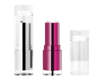 Three non-guided lipstick packaging are shown: one closed with a clear and silver design, one open with a pink casing and white lipstick, and one clear cap placed separately on the right.