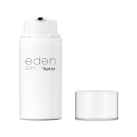 A white cylindrical bottle labeled Eden Slim by Aptar with a pump dispenser, shown next to its clear removable cap, features airless packaging for skincare against a white background.