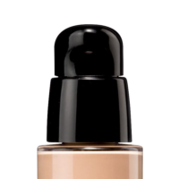 A close-up of a foundation bottle with a black cosmetic pump labeled Evolution dispenser and beige liquid inside, set against a white background.