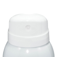 Close-up of Vail, a white plastic aerosol actuator for large cans, with a rounded cap, showing the top and nozzle against a plain white background.