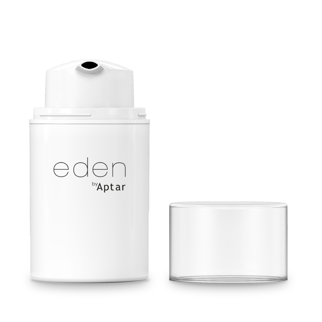A white cylindrical bottle labeled eden by Aptar features a pump dispenser and a clear, removable cap beside it, showcasing airless packaging for skincare against a white background.