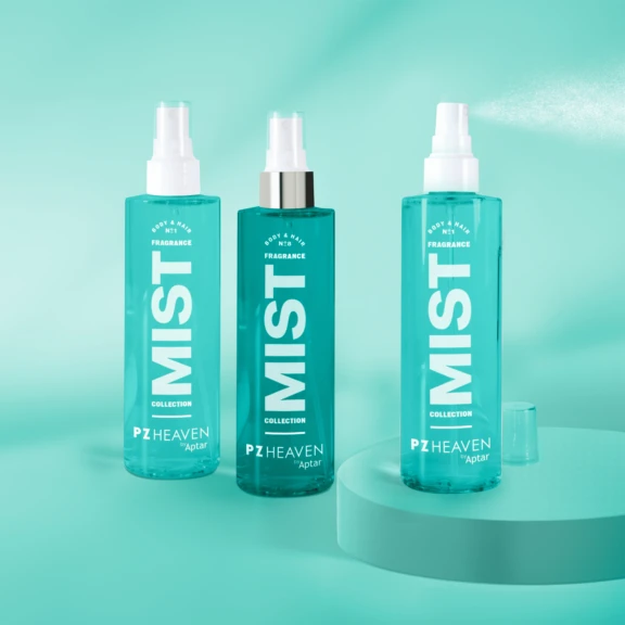 Three turquoise spray bottles labeled MIST COLLECTION and PZ HEAVEN Aptar, each featuring a Classic Fine Mist Spray Pump, are displayed on a teal background, with one bottle cap removed and lying nearby on a round platform.
