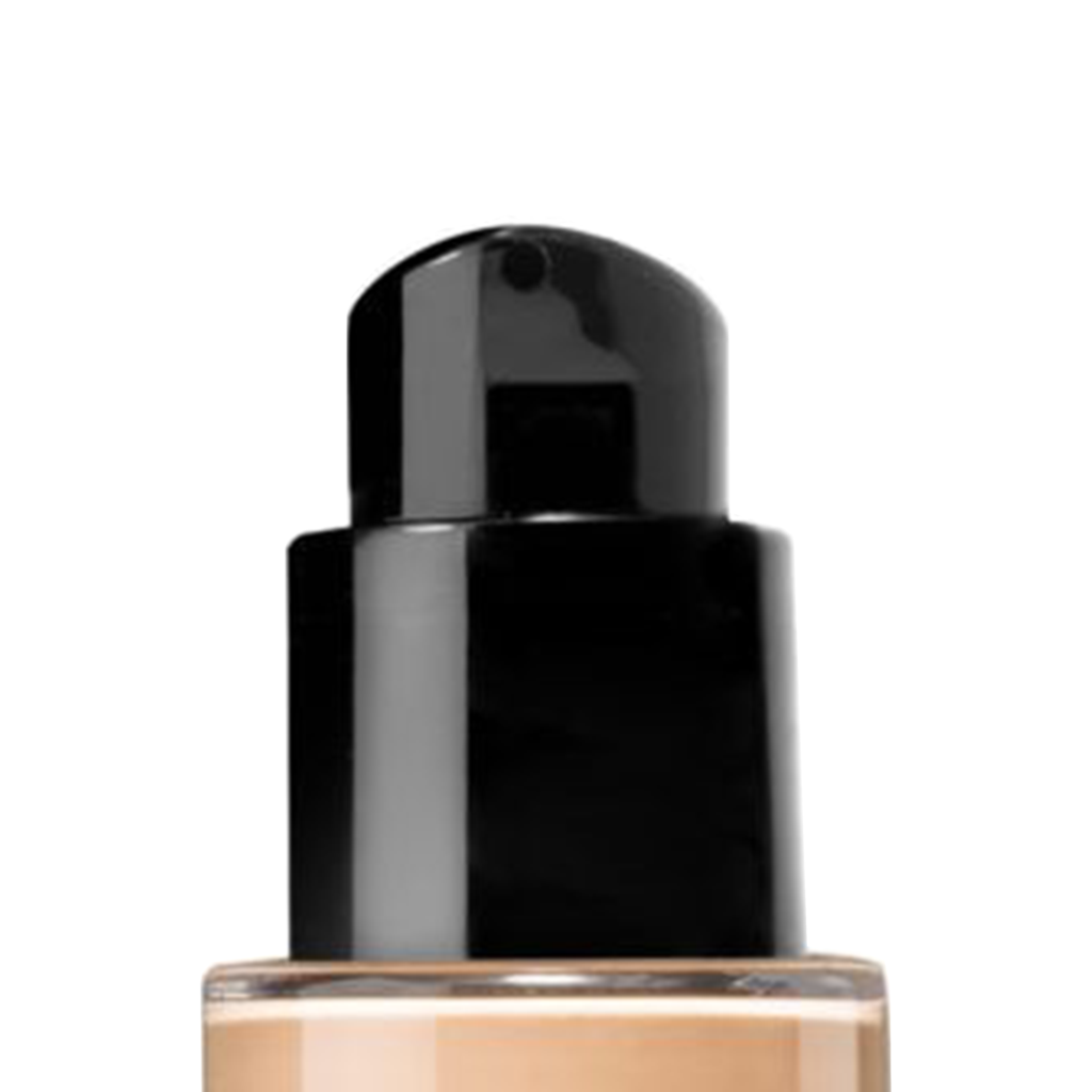 Close-up of a versatile cosmetic pump named Metropolitan atop a black dispenser bottle of liquid foundation, with beige product visible inside the transparent lower section, isolated on a white background.