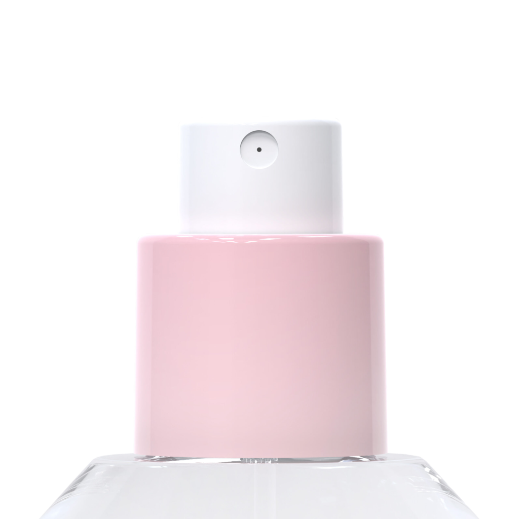 Close-up of a perfume bottle featuring the Color Screw refillable plastic fragrance pump in light pink and white, mounted on a clear glass base and set against a white background