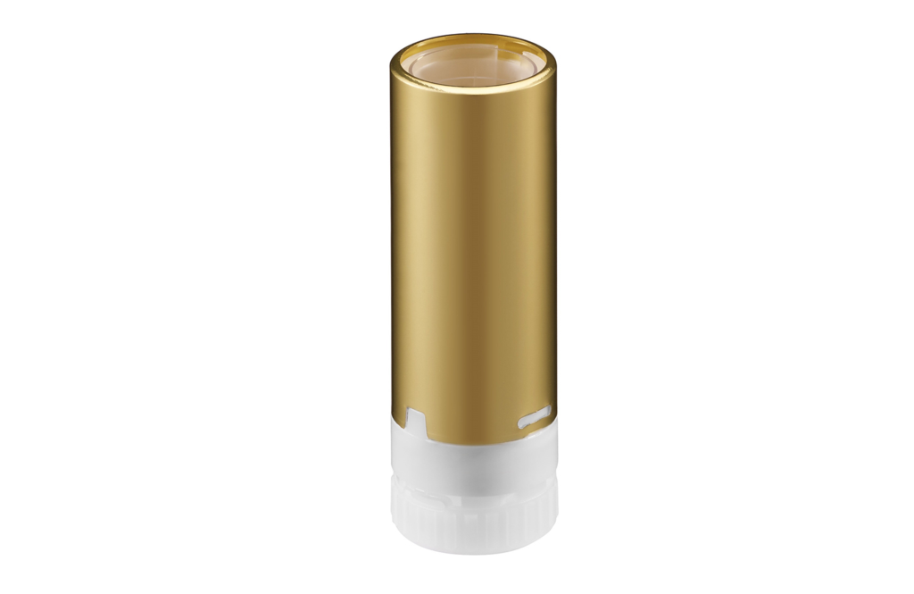 A gold and white cylindrical container with a shiny metallic gold body, featuring a Non-Guided Lipstick Mechanism named Iconic and a white base, standing upright on a plain white background.
