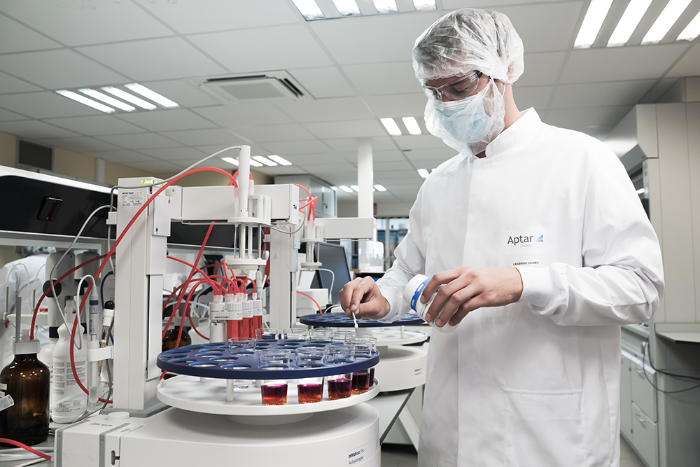 Operator doing chemical analysis for rubber components