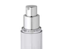 A close-up of a classic premium airless packaging named Sirius: a clear cylindrical pump bottle with a shiny silver dispenser and collar, typically used for cosmetics or skincare products, against a white background.