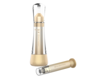 Aptar Beauty’s Serumony refillable airless dropper in sleek gold packaging is displayed alongside its matching refill cartridge.The dropper features a metallic gold collar and a clear body, set a plain white background.
