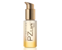 A clear bottle with a high-performing twist-to-lock pump and a gradient yellow base, labeled PZ Lark OIL-EDITION by Aptar, shown against a plain background.
