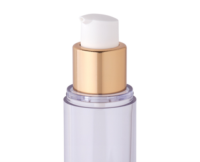 A clear plastic pump bottle with a gold and white dispenser, photographed against a white background, showcases classic premium airless packaging labeled Sirius for an elegant, modern look.