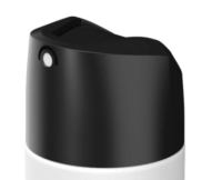A close-up of a black and white plastic actuator  against a plain white background, resembling the design of a spray-through aerosol actuator called Graphite.