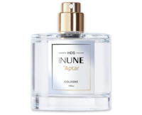 A clear glass bottle of cologne labeled HDS INUNE by Aptar features a gold high definition spray fragrance pump and a metallic label, containing 100 ml of fragrance.