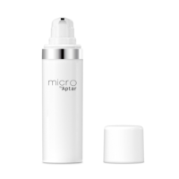 A white cylindrical airless packaging and a silver band near the top, labeled micro by Aptar. The pump dispenser is exposed and the white cap is placed to the right of the bottle.