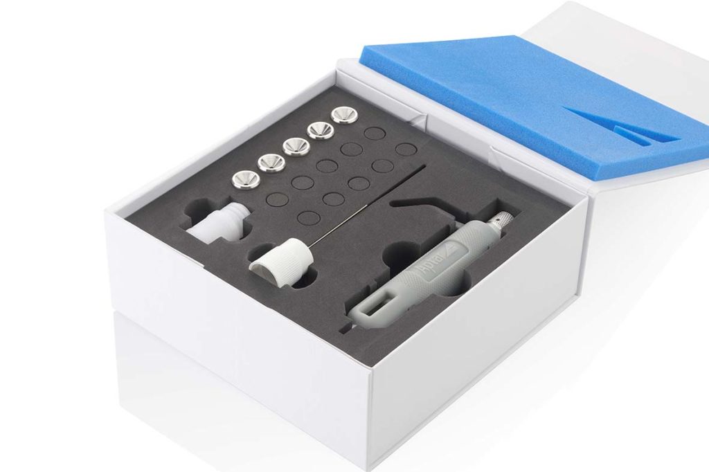 Aptar Pharma's PADA Starter Kit with the lid open showing the individual components for the kit