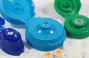 three brightly-colored custom closure solutions with flow control valves