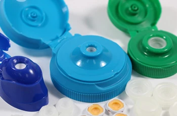 three brightly-colored custom closure solutions with flow control valves