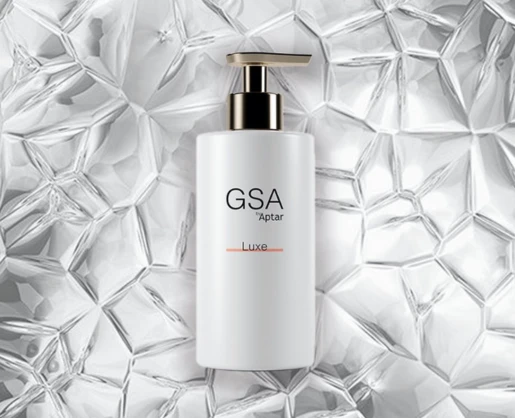 Aptar Beauty's GSA Luxe Dispensing Lotion Pump on a diamond background