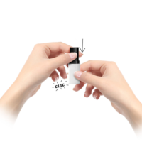 Two hands hold a small refillable lipstick packaging labeled "Private Refill", with a white body and black cap, shown against a plain white background. An arrow and the word "CLIC" indicate the cap is pressable to open or close the container.