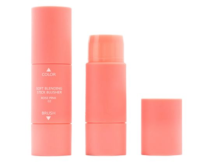 Two coral-pink face stick components, including an assembled, a partially open, and a detached cap, on a white background.