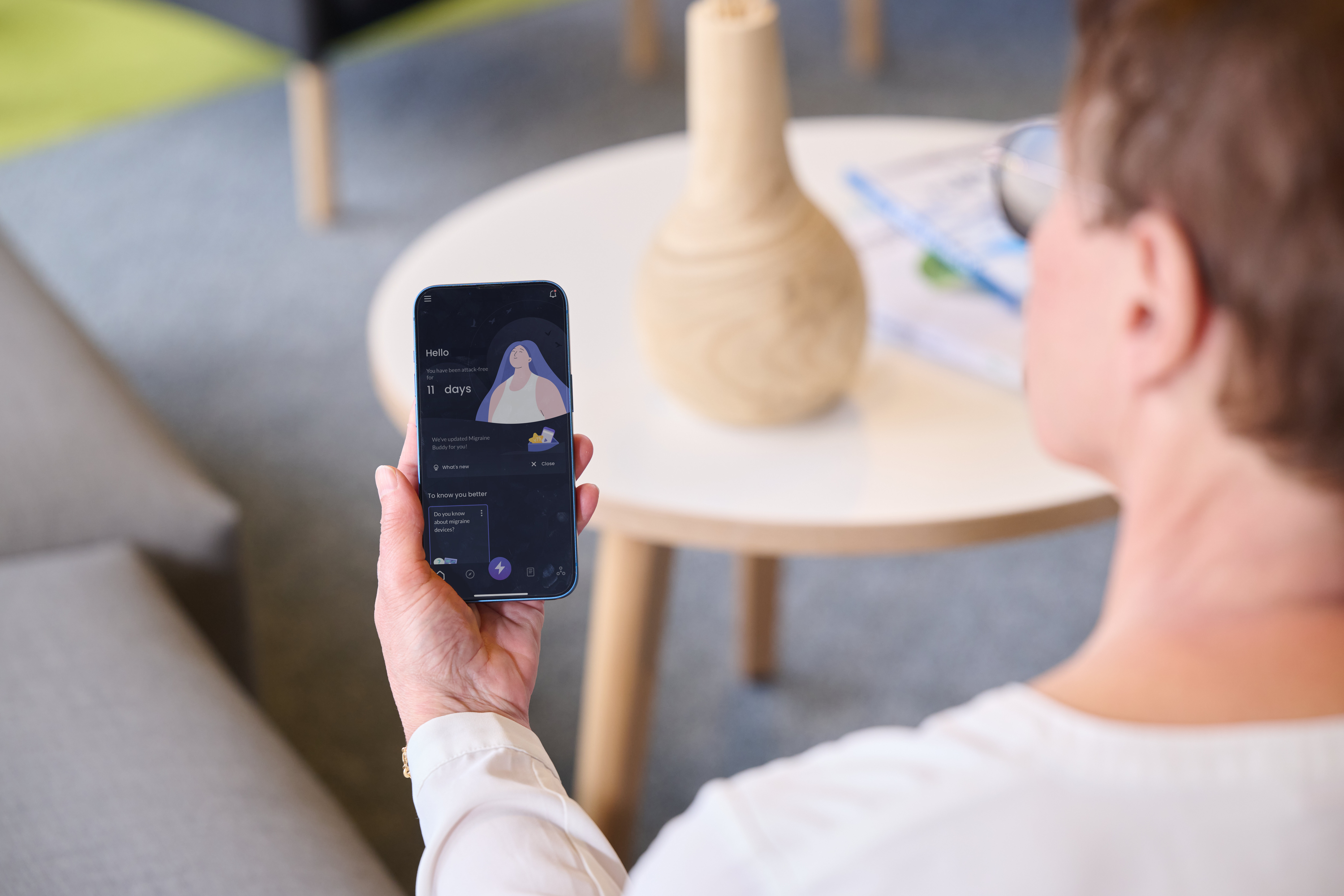 Patient using a companion app to support onboarding, engagement and treatment management.