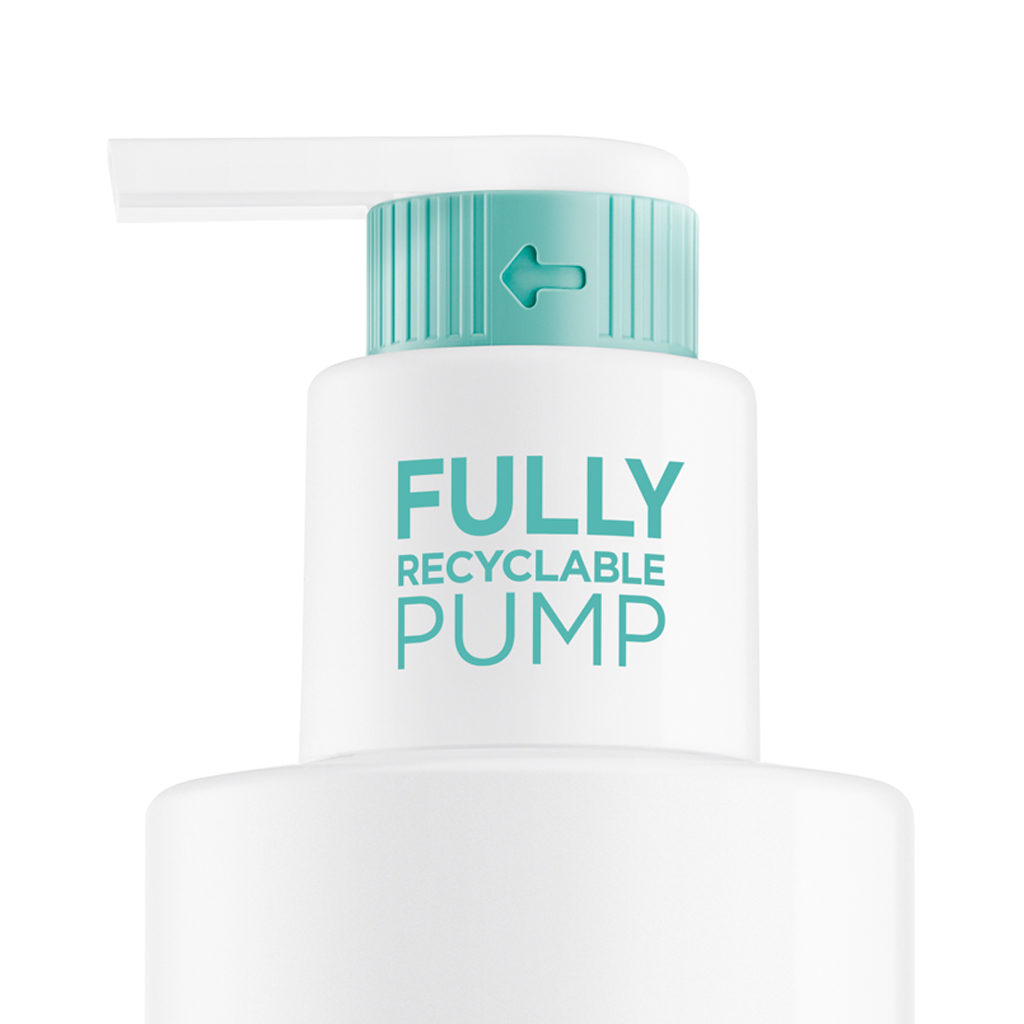 A close-up of a white bottle with a turquoise fully recyclable dispensing pump named Future. The label reads FULLY RECYCLABLE PUMP in turquoise letters, and an embossed arrow shows the twisting direction.