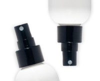 Two white bottles with a black Euromist 2-way spray pump are shown on a white background.One is positioned upright and one tilted to the left.