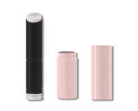 A black lip balm stick with a white balm exposed stands upright, featuring a Guided Lipstick Mechanism, next to an empty light pink tube and a matching pink cap, all on a white background, part of the Stylist Guided Lipstick Mechanism range.