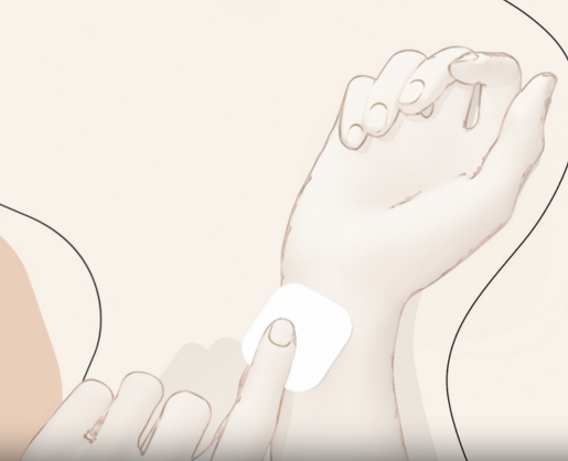 Illustration of a hand placing an innovative fragrance paper sampling pad on the inner wrist of another hand.