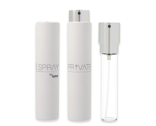 Three refillable fragrance purse spray bottles are shown: two with white outer cases and silver caps, and one clear glass bottle with a silver spray top, revealing the inner mechanism. All bottles stand upright.