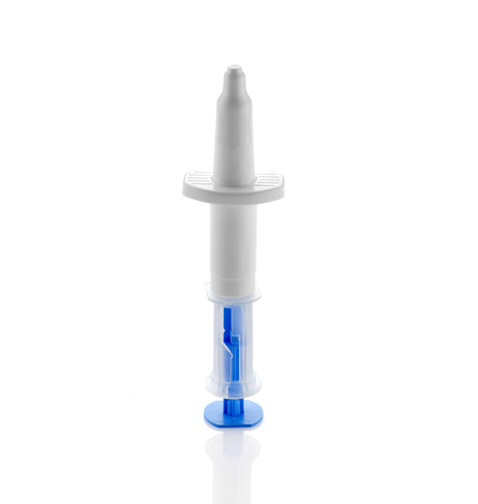 Aptar Pharma's liquid intranasal spray vaccine device with finger flange and blue plunger on a white background.