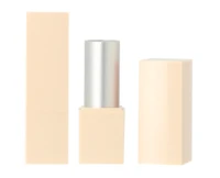 A beige non-guided lipstick packaging with a silver bullet, shown with the cap off and placed beside the open container, all on a plain white background. 