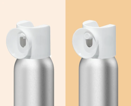 Two silver aerosol bottles with white caps are displayed side by side against a vertically split beige and peach background. Each bottle features Sirena , Aptar Beauty's Aerosol Actuator with Bold Design.