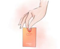 An illustrated hand gently pulls an orange ultra-flat fragrance sampling card, with the product name 'Imagin' printed at the bottom. The 'PULL' label visually guides the gesture, emphasizing an intuitive user experience.