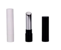 Three lipstick tubes are shown: one with a white cap, one open with a silver lipstick exposed, and one with a black cap, all standing upright on a white background.