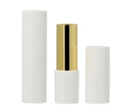Three non-guide lipsticks packaging are shown: two white tubes with one uncapped, revealing a shiny gold inner tube in the center.