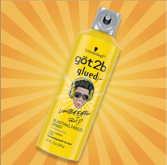 A yellow can of glued Blasting Freeze Spray featuring an aerosol actuator with bold design named Sirena, cartoon face in sunglasses and headphones,set against a sunburst orange background.