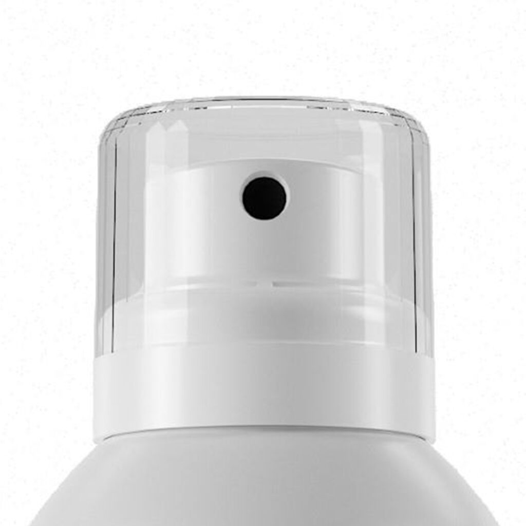 Close-up of  WS25, a Modern Aerosol Actuator  with a transparent plastic cap, showcasing the black nozzle in the center and highlighting its modern aerosol actuator design.