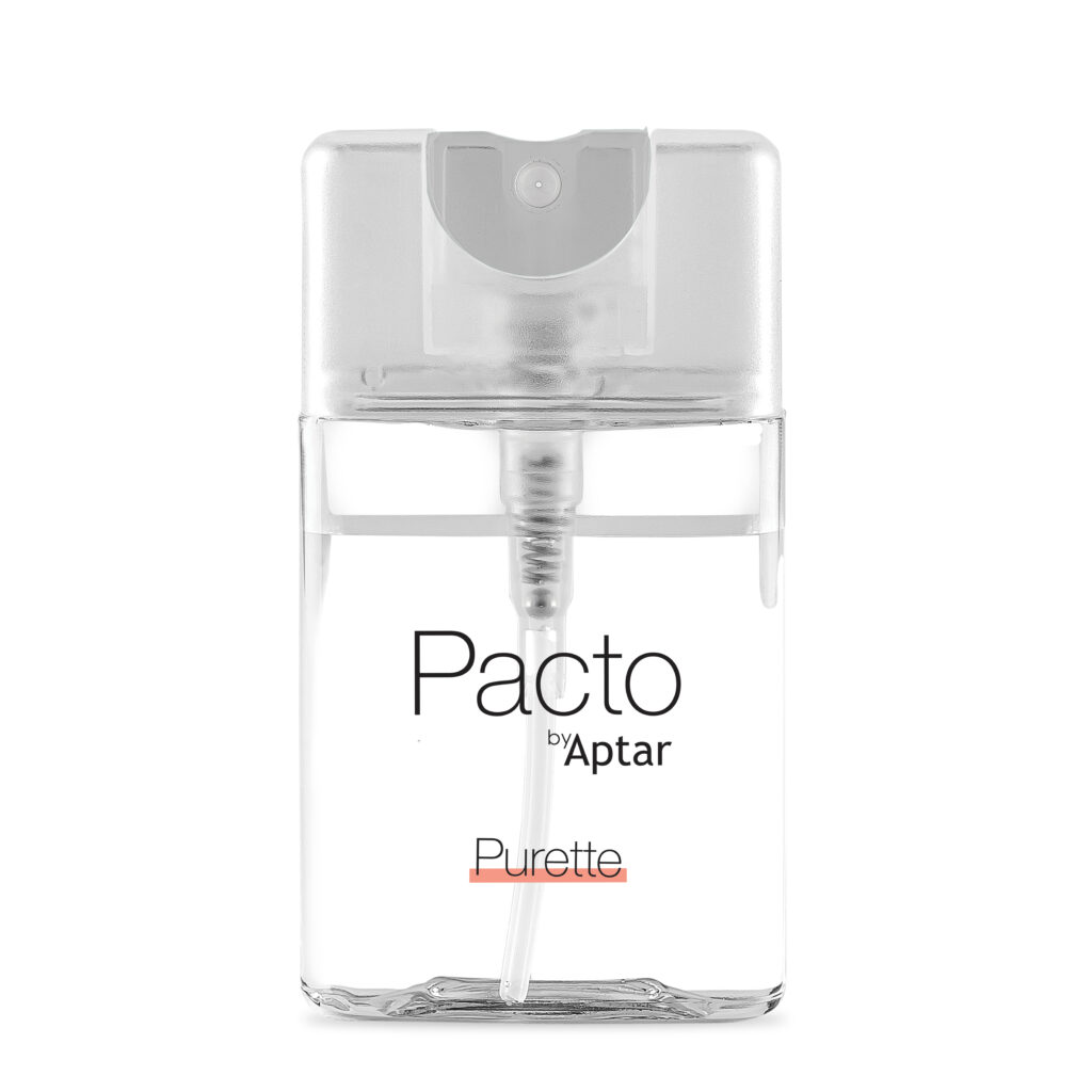 A Purette Fine Mist bottle with flat mini packaging is standing upright on a white background. The bottle features a white spray top and contains a clear liquid.