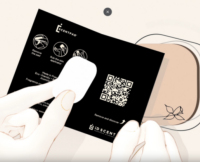 A hand rubs a white pad on a black card with instructions, icons, and a QR code, showcasing Innovative Fragrance Paper Sampling.