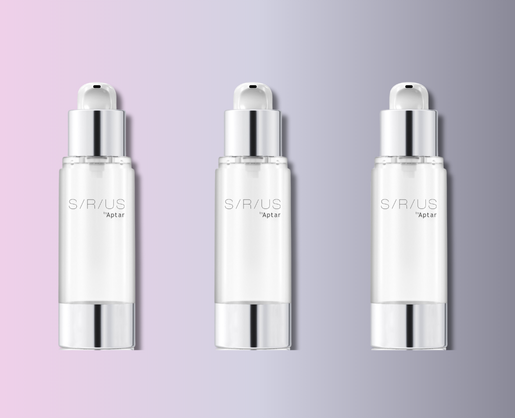 Three classic premium airless packaging with silver caps, labeled SIRIUS Aptar, are displayed side by side against a soft pink and purple gradient background.