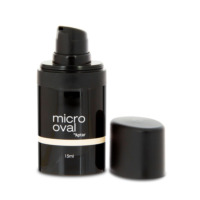 A black, oval plastic bottle labeled Micro Oval by Aptar 15ml with a pink band stands next to its removed matching cap on a white background, showcasing a type of airless packaging decoration available from Aptar Beauty.