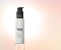 Novus Advance packaging with black pump on a soft pink background, highlighting recyclable packaging.