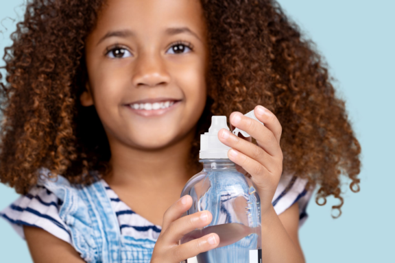 Young girl with Life water bottle