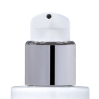 Close-up of a versatile cosmetic pump labeled Metropolitan in silver and white on top of a clear bottle, commonly used for skincare or cosmetic products. The nozzle is centered against a plain white background.