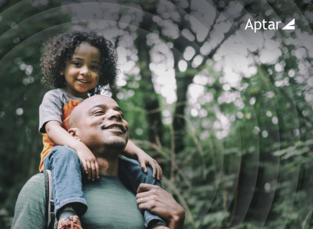 A father carrying his child on his shoulders
